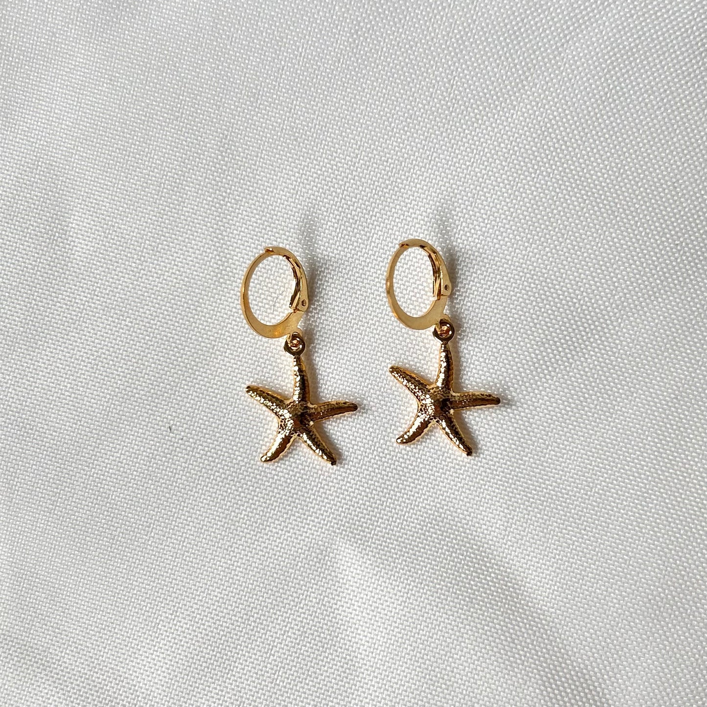 gold seastar earrings
