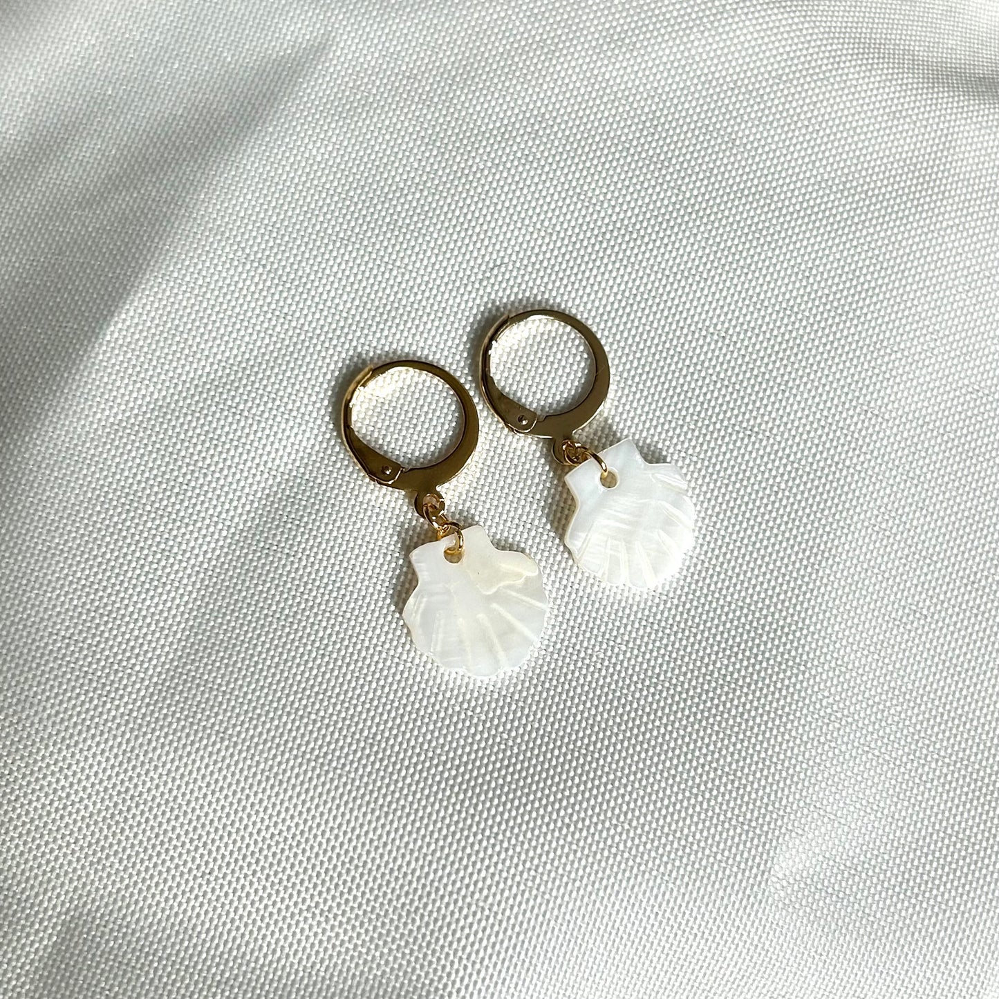 white shell earrings