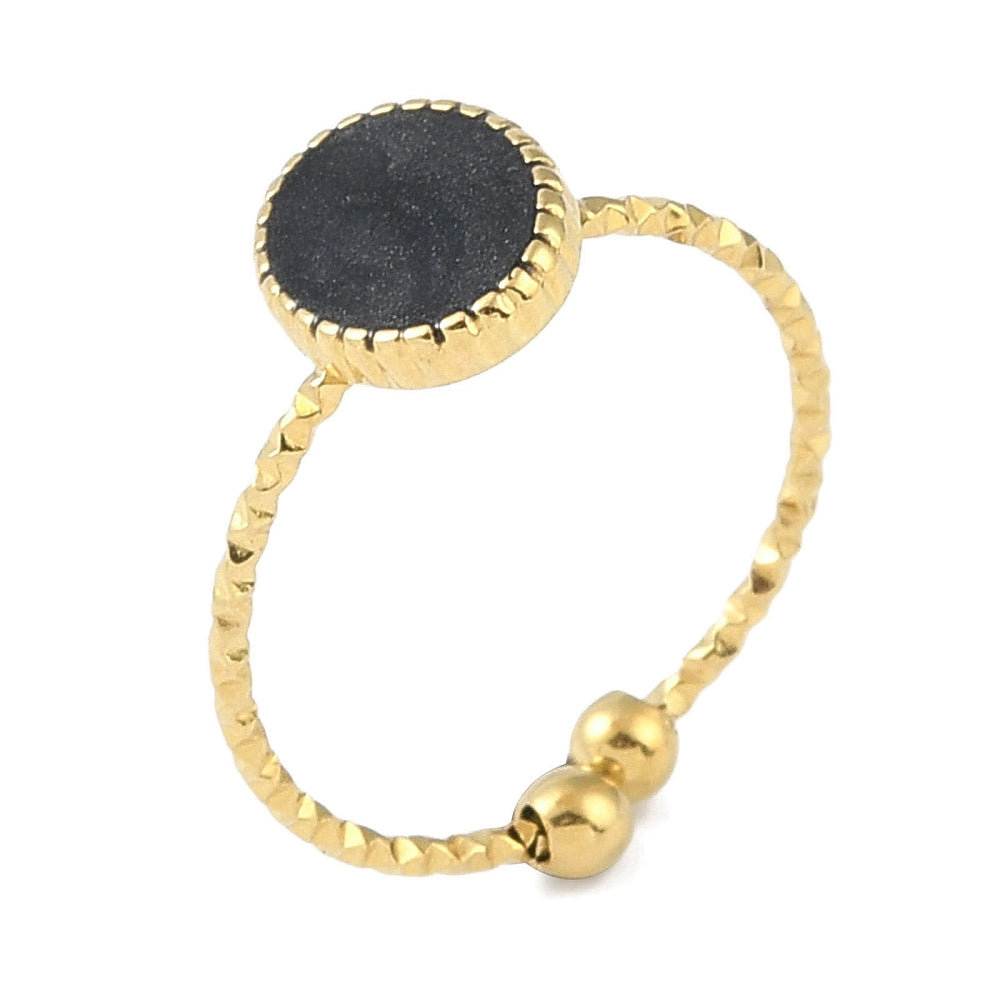 gold ring with black oval