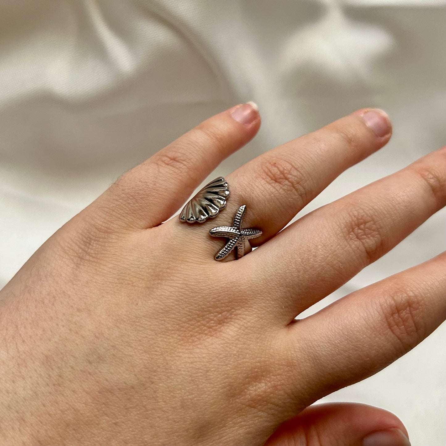 silver ring in ocean style