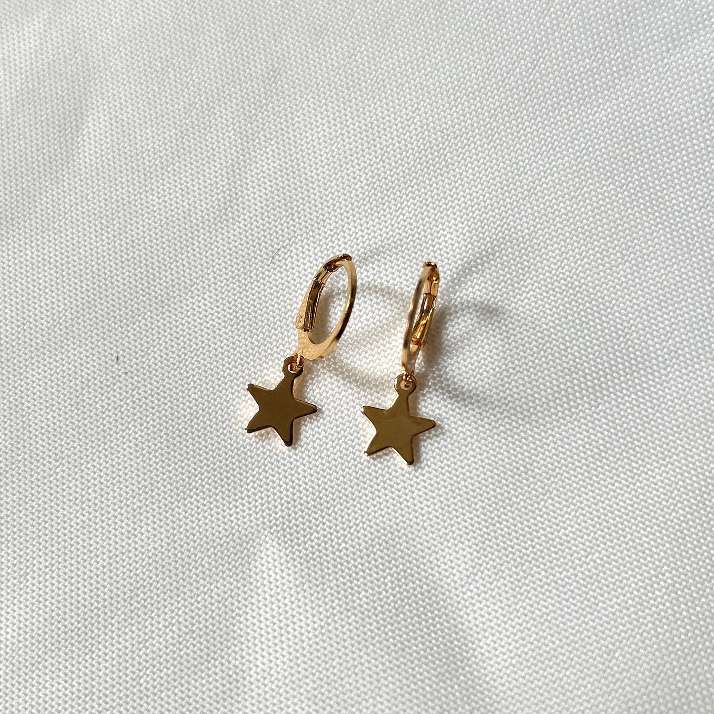 gold star earrings