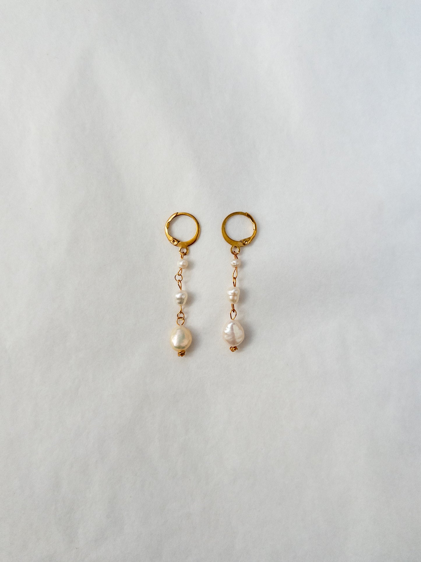 dangling pearl earrings