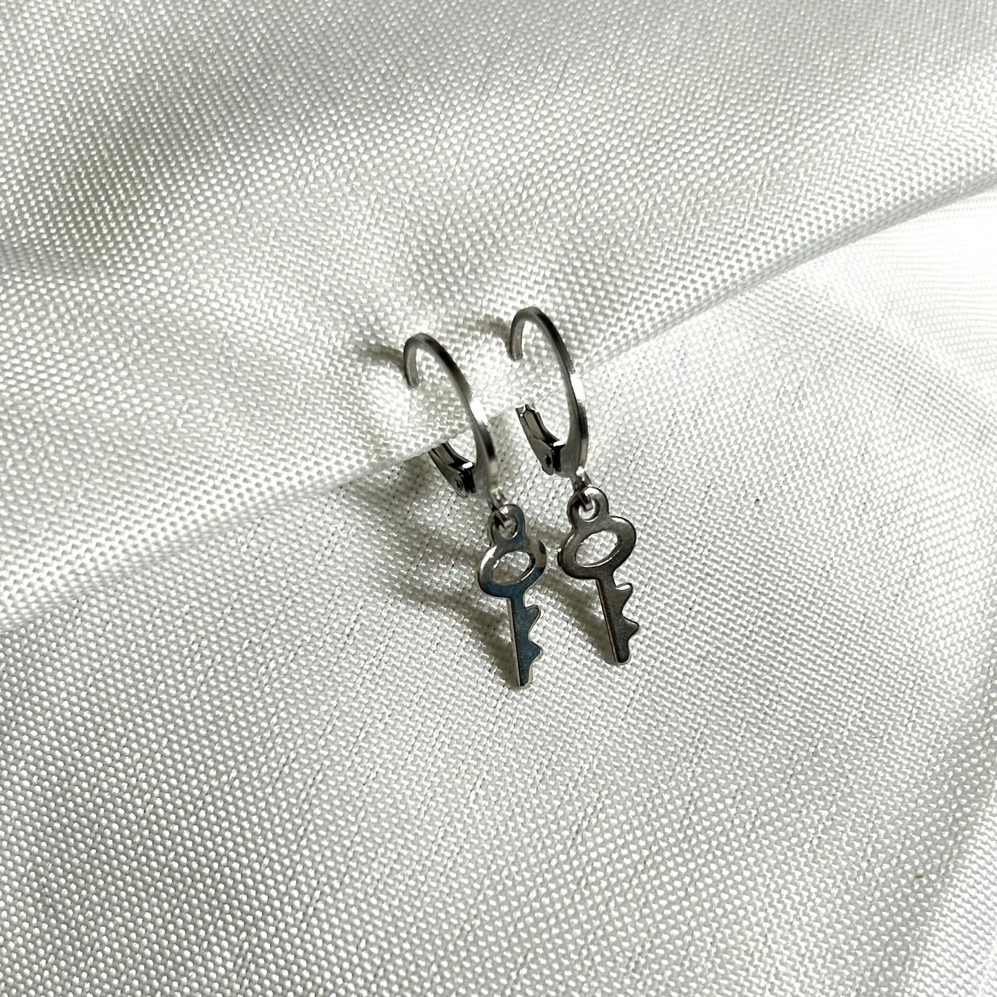 silver key earrings