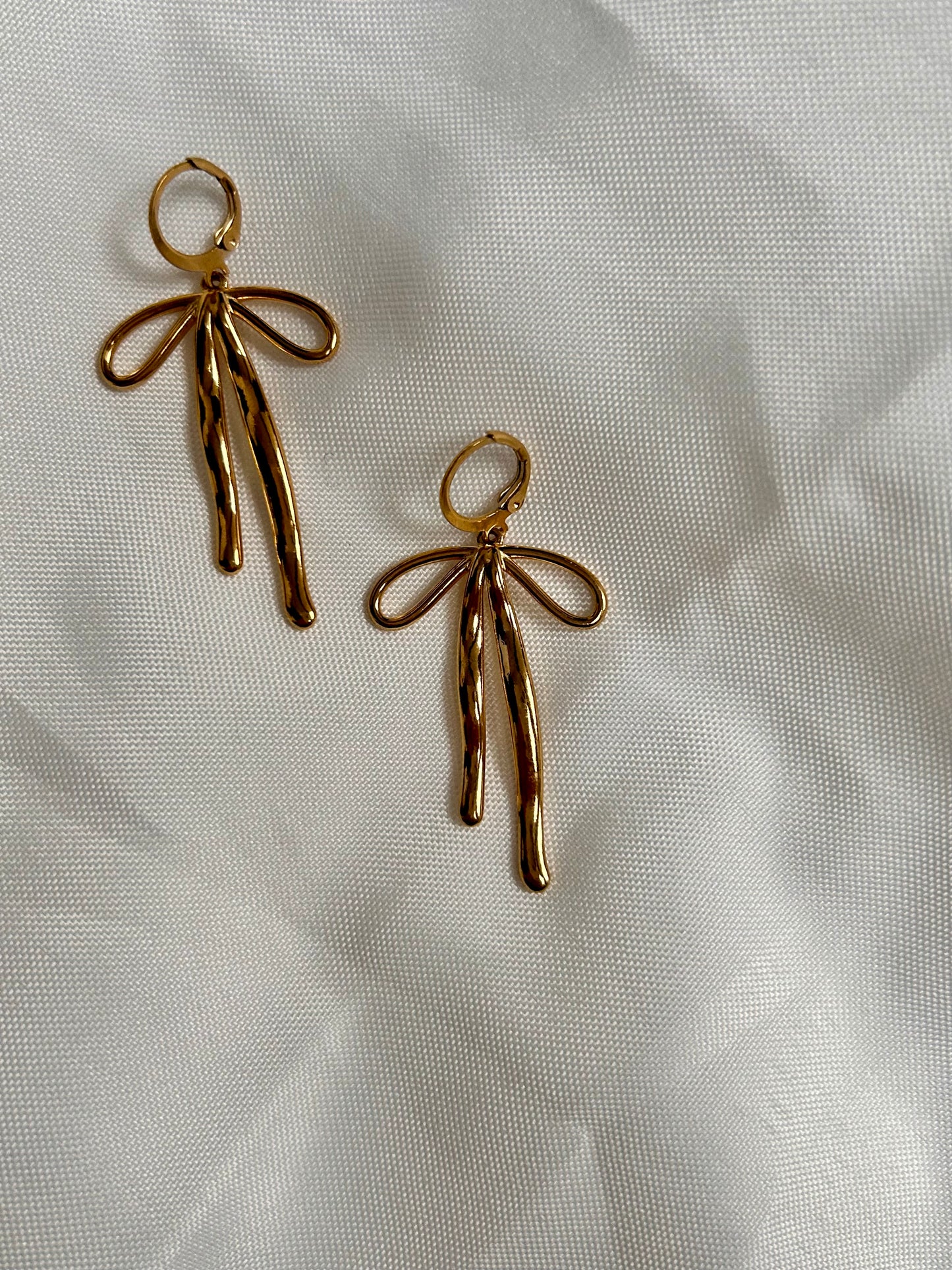 statement bow earrings