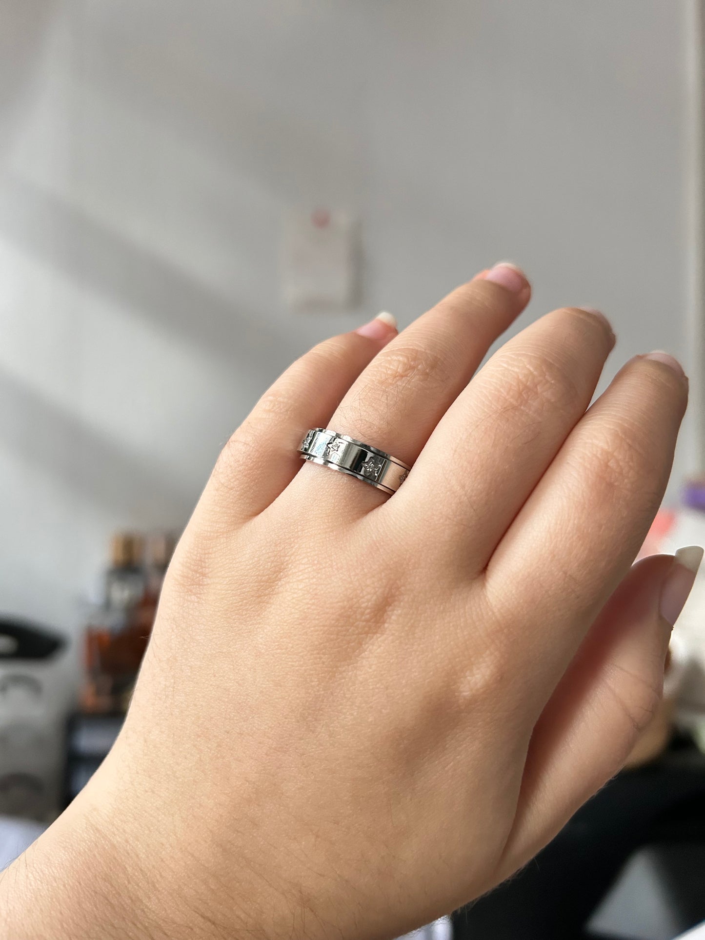 silver ring that spins