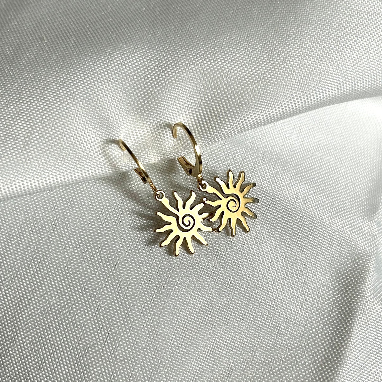 gold funky sun earrings