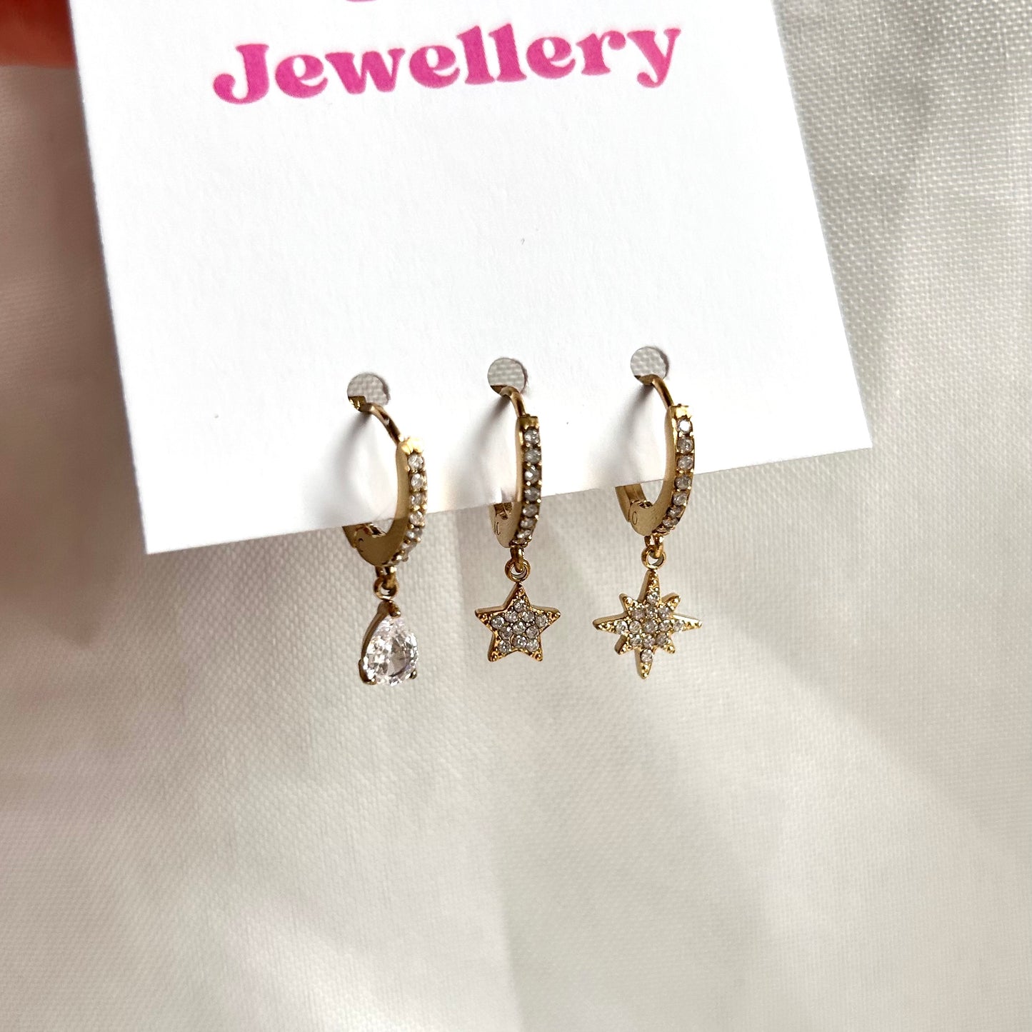 gold earring set with crystals