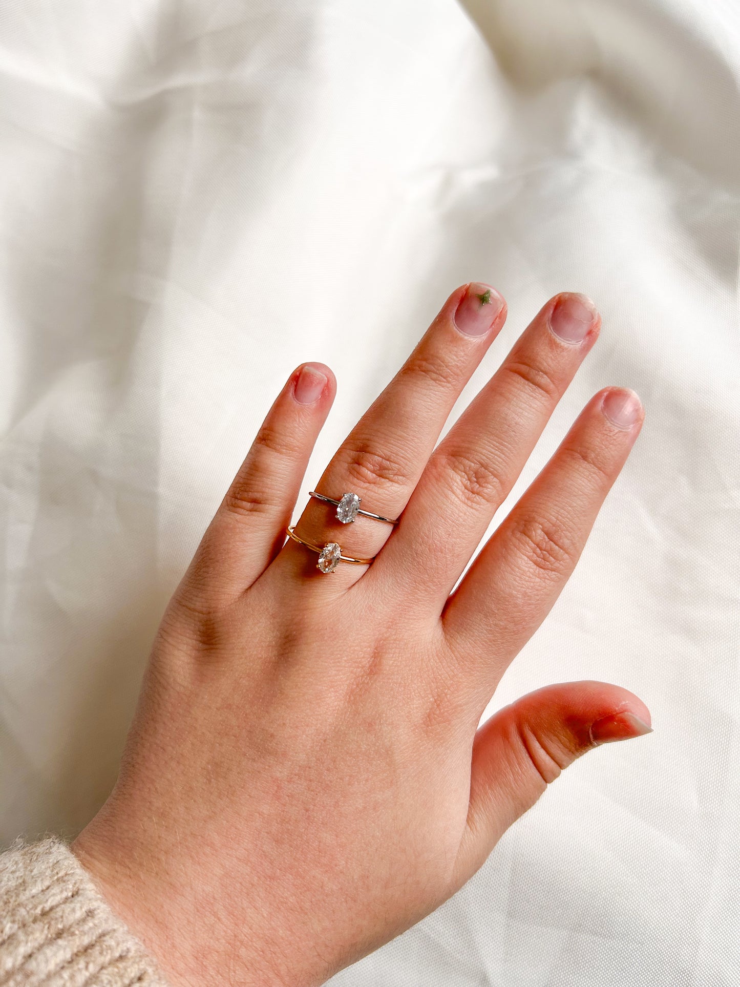 silver ring with small crystal