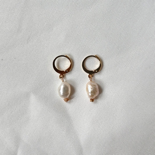 big pearl earrings