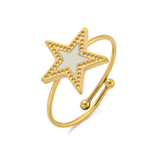 gold ring with white star