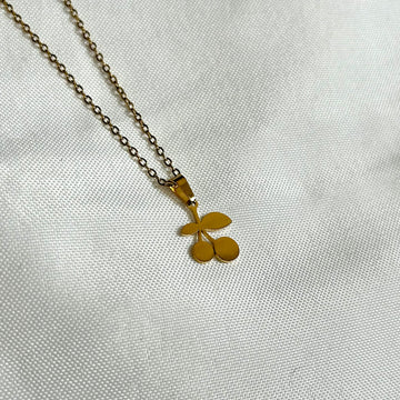 gold necklace with cherry charm